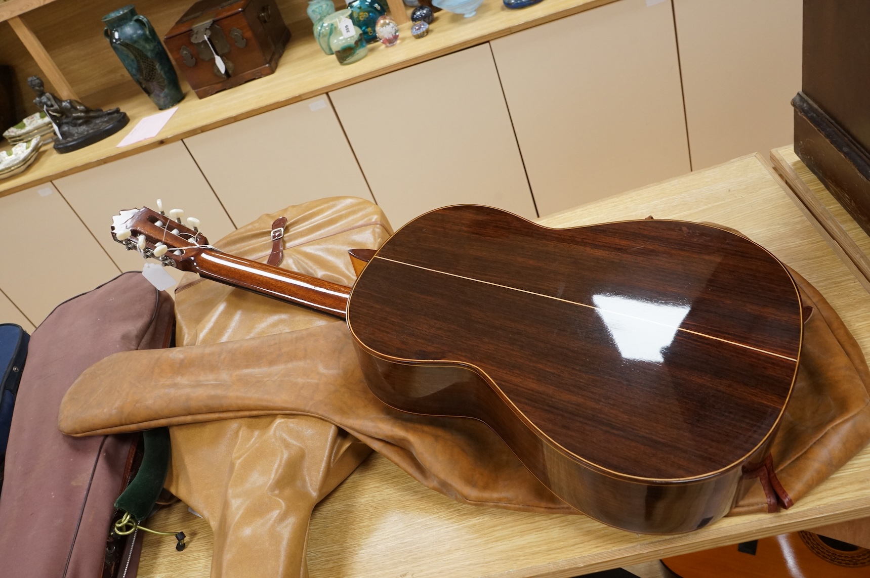 A Spanish Manuel Contreras classical guitar, with cedar front, Indian rosewood back sides and ebony fingerboard, with makers label inside body; M.G. Contreras, Madrid, back 49cm